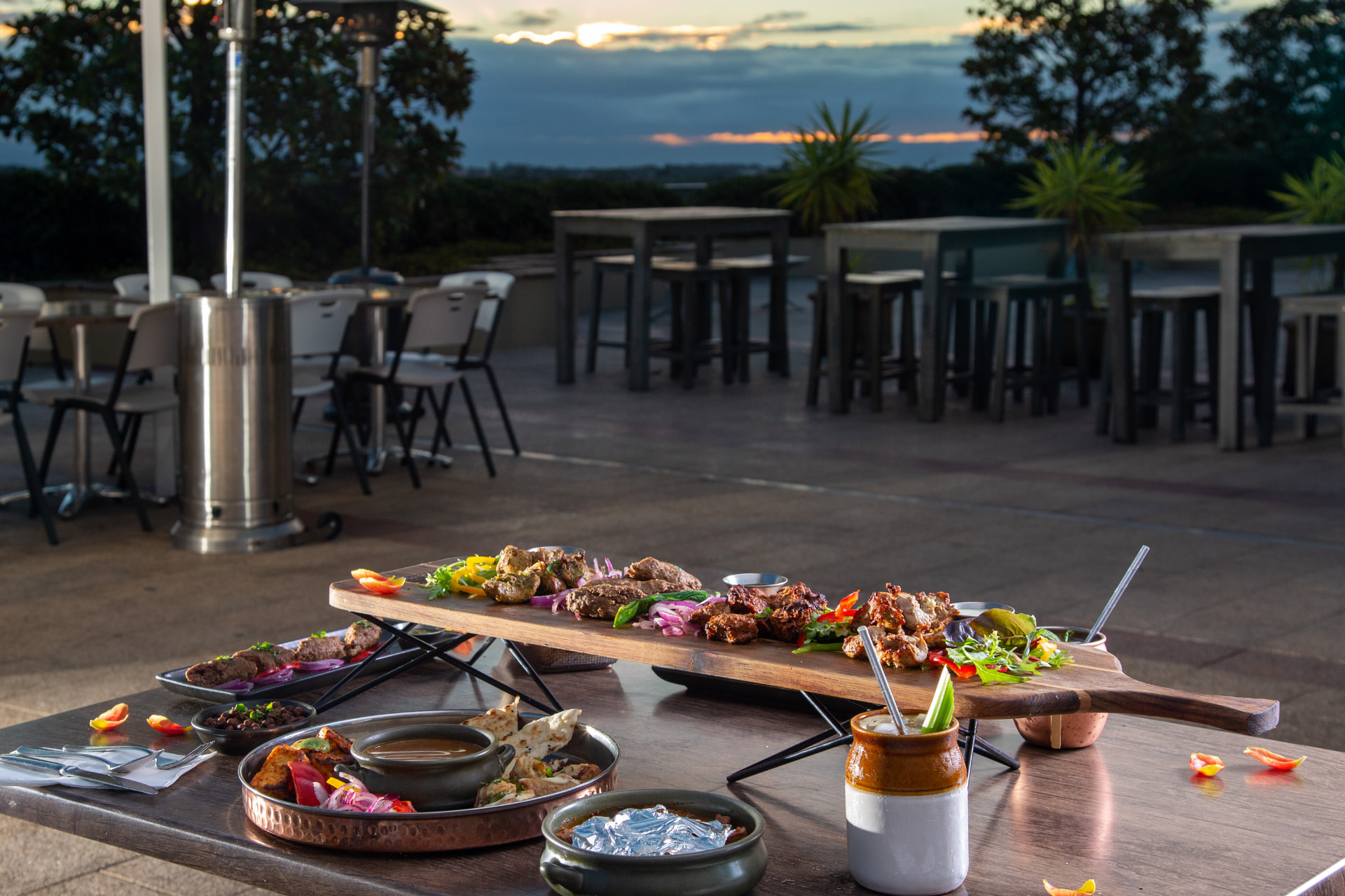 Kebabiya sharing platter on the Bella Vista terrace at sunset