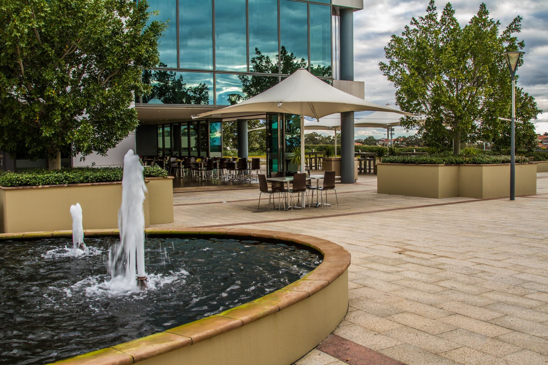 Wide daytime view of the cafe and outdoor terrace
