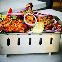 Original photograph of Bhatti Da Murg served on a grill