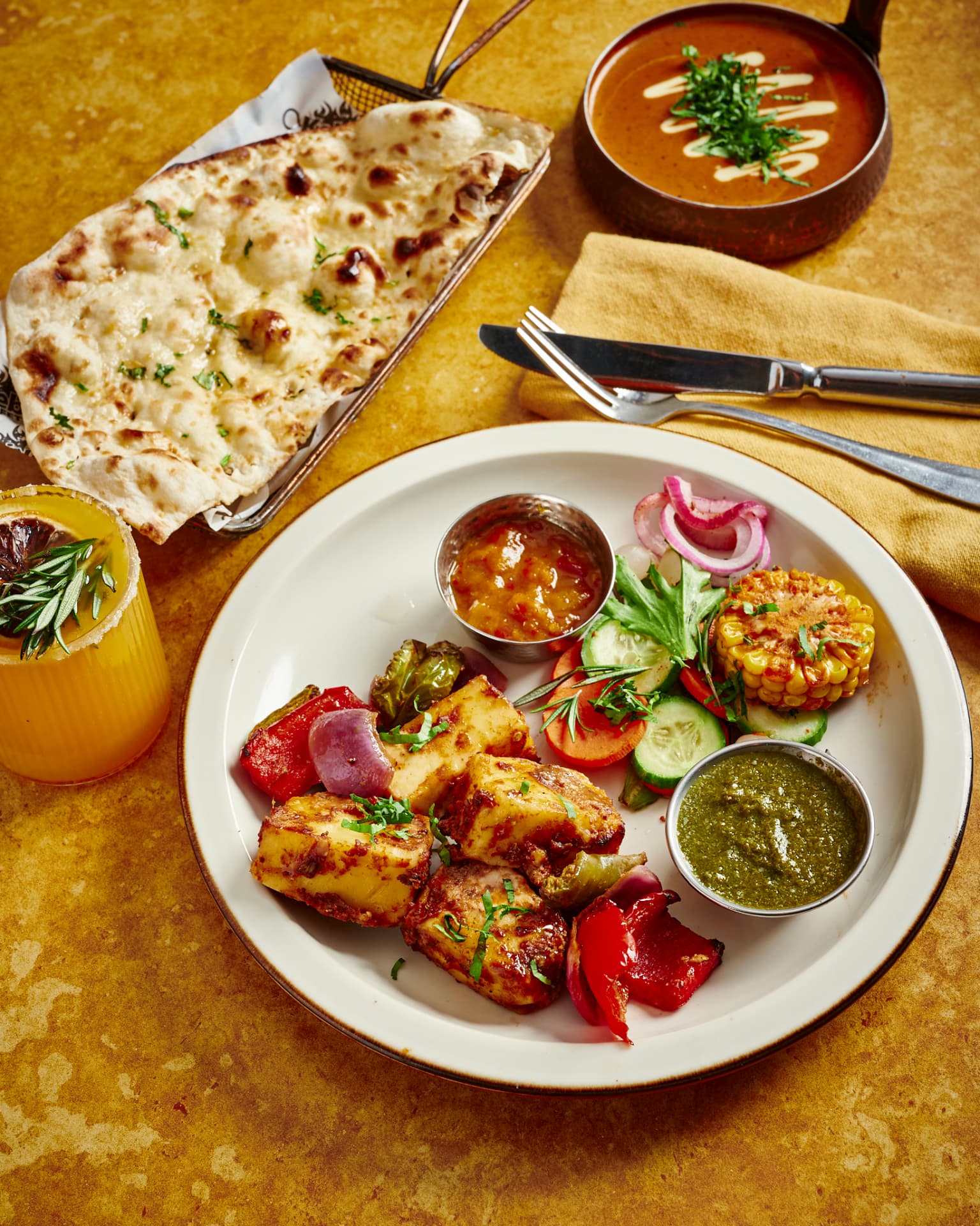 Original photograph of Paneer Anardana Kebab with peppers and chutneys
